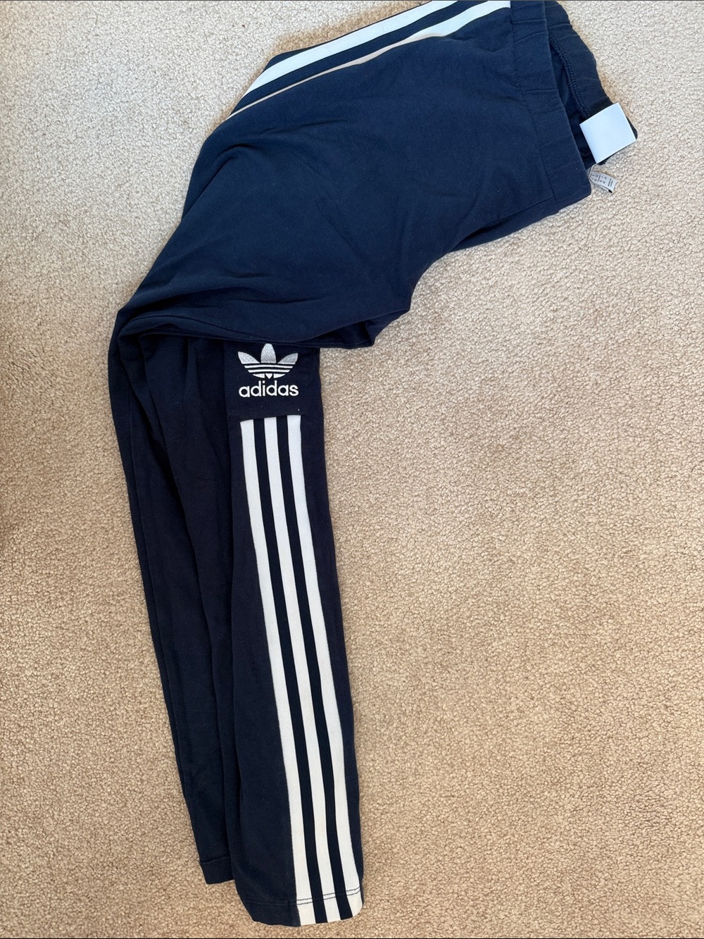 adidas navy blue leggings with white three-stripe detailing